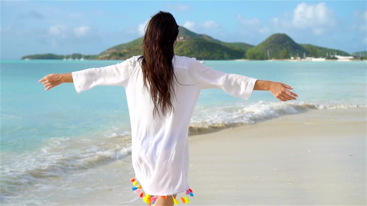 Woman embracing the sea